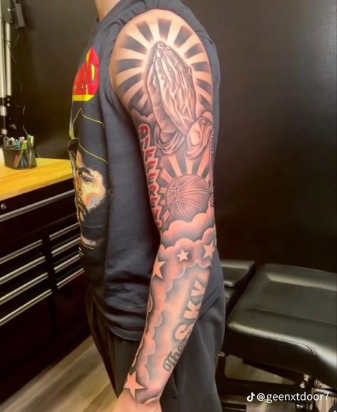 Cloud Shoulder Tattoo Men, Top Of Bicep Tattoo Men, Cool Upper Arm Tattoos For Men, Red And Black Ink Tattoos Men, Sky’s The Limit Tattoo Men, God Shoulder Tattoo Men, Inside Bicep Tattoo Men Half Sleeves, Men’s Family Arm Sleeve Tattoo, Bicep Sleeve Tattoo Men