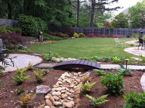 Bridge Over Dry Creek Bed | HGTV Dry Creek Bed, Dry River, Outdoor Play Areas, Creek Bed, River Bed, Dry Creek, Easy Plants, Landscaping Design, Landscaping With Rocks