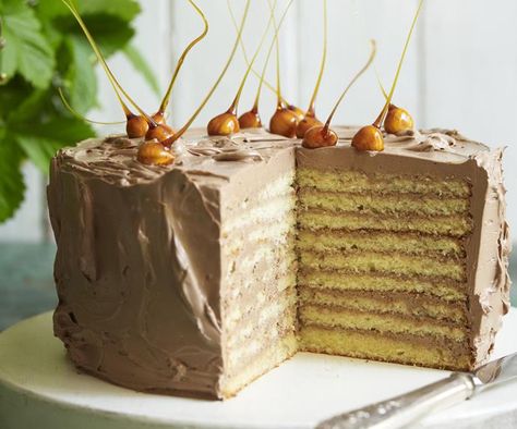 These striking caramel hazelnuts are really eye-catching, adding an extra dimension to this famous European layered cake. Perfect for any occasion where you need to make an impact. Dobos Torte Recipe, Dobos Torte, Hungarian Cake, Muesli Bars, Torte Recipe, Cake Mixture, Layered Cake, Chocolate Butter, Make An Impact