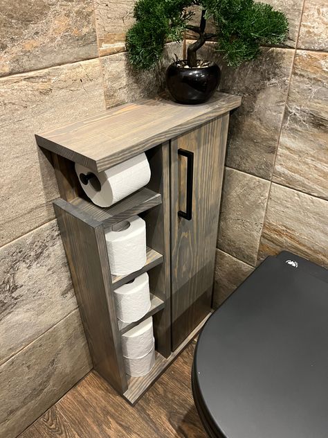 Looking for a practical and stylish addition to your bathroom? Our rustic wood toilet roll paper holder is just what you need! This holder is inspired by NEXT and features a beautiful Grey Wood finish. It's also available in different colours to suit your style. Measuring, 80 cm high x 44 cm wide x 18 cm deep this holder is the perfect size for any bathroom. It's designed to be used from the sitting position, making it easy and convenient to use. This holder is not only practical, but it will al Gray Painted Furniture, Wood Toilet Paper Holder, Cloakroom Toilet, Wood Toilet, Toilet Brush Holder, Tiny House Trailer, Small Toilet, Roll Paper, Casa Container