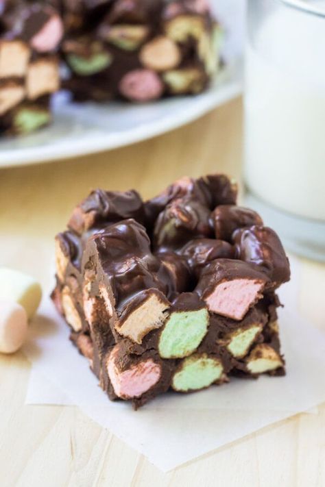 Chocolate confetti squares are an easy, retro dessert with only 4 ingredients. Soft & chewy with a hint of peanut butter and sweet, fluffy marshmallows Chocolate Marshmallow Bars, Confetti Squares, Peanut Butter Marshmallow Squares, Fluffy Marshmallows, Marshmallow Bars, Retro Desserts, Peanut Butter Marshmallow, Chocolate Marshmallow, Square Recipes