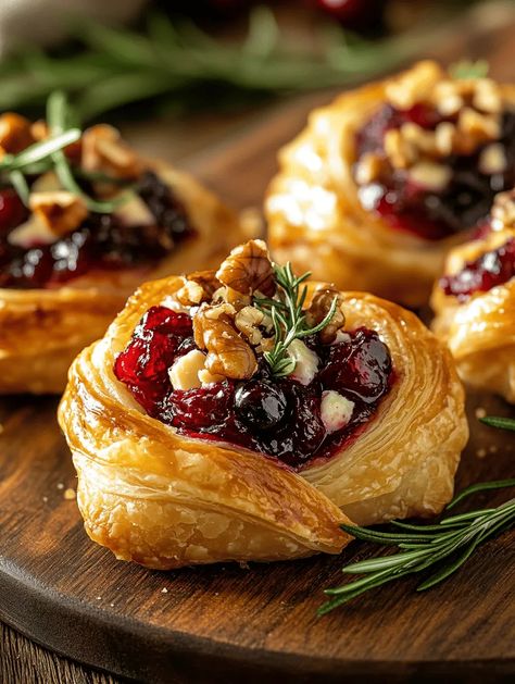 Easy Cranberry Brie Bites Recipe – A Delicious Appetizer for Any Occasion - Sanepe Recipes Cranberry Goatcheese Appetizer, Cranberry Pecan Brie Bites, Black Tie Appetizers, Puff Pastry With Brie And Cranberry, Cranberry Puff Pastry Brie, Brie Pastry Puff Appetizer Recipes, Baked Camembert Cranberry, Cranberry And Brie Flowers, Cranberry Brie Puff Pastry Bites