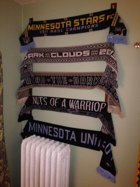 How To Make a Soccer Scarf Display – This Old Minneapolis House Cheap Basement Ideas, Soccer Room, Soccer Flags, Soccer Scarf, Scarf Rack, Bloxburg Basement, Scarf Display, Minecraft Basement, Teenager Bedroom Boy