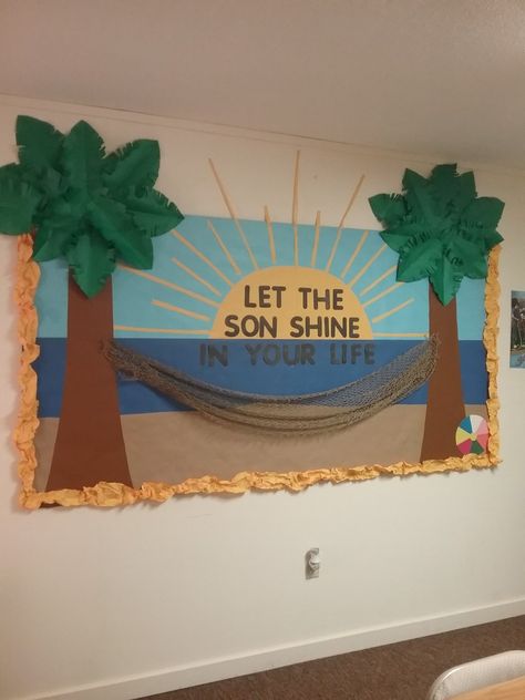 When you need to redo the bulletin board in your Sunday school class but don't have a creative bone in your body. Thank goodness you have a daughter that does. Beach Themed Hallway Decor School, Palm Tree Bulletin Board, Surf Theme Bulletin Board, Bulletin Board Beach Theme, Ocean Theme Classroom Door, Beach Theme Vacation Bible School, Surfing Into Summer Bulletin Board, Beach Bulletin Boards, Disney Bulletin Boards