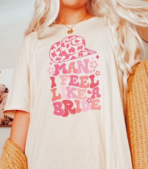 21 Fun Bachelorette Party Shirt Ideas For Fun Bridal Parties Retro Cowboy Bachelorette, Pink Disco Cowgirl Bachelorette, Western Bride Shirt, Disco Cowgirl Bachelorette Shirts, Beach Cowgirl Bachelorette Party, Groovy Cowgirl Bachelorette, Man I Feel Like A Bride Shirt, Western Disco Bachelorette Party, Brides Last Rodeo Bachelorette Party