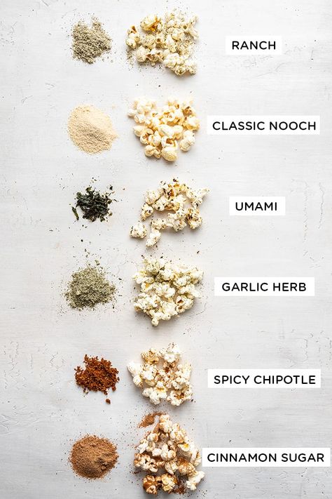 Learn how to make 6 easy popcorn seasonings: Ranch, Classic Nooch, Umami, Garlic Herb, Spicy Chipotle, and Cinnamon Sugar! Take your popcorn to the next level while still keeping it healthy. Popcorn Spices Seasoning Mixes, Salt Free Popcorn Seasoning, Vegan Popcorn Seasoning, Popcorn Mix Ins, Popcorn Seasoning Ideas, Healthy Popcorn Seasoning, Spicy Popcorn Seasoning, Ranch Popcorn Seasoning, Healthy Popcorn Toppings