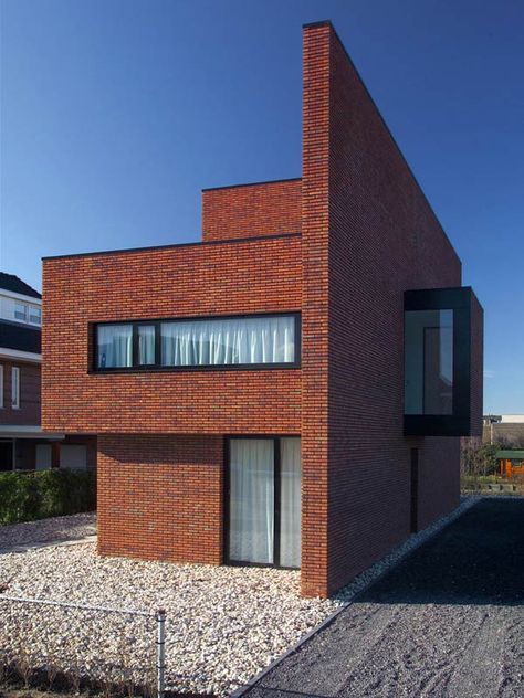 Brick Wall House boasts minimalist style with maximum appeal Brick Wall House, Modern Brick House, Brick House Designs, Contemporary Building, Brick Exterior House, Brick Architecture, Brick Facade, Brick Design, Minimalist Architecture