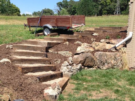 Railroad tie timber steps filled with pea gravel. (Outdoor, exterior, landscaping, stairs) Timber Steps, Terraced Patio Ideas, Railroad Ties Landscaping, Railroad Tie, Pea Gravel Patio, Landscape Stairs, Landscape Steps, Gravel Patio, Sloped Backyard