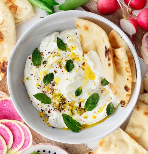 If you're not already making labneh, now's the time to start! This soft Middle Eastern cheese is thick, creamy, tangy, and super easy to make. Serve it as a dip with veggies and pita, or add it to salads, sandwiches, pizza, and more! | Love and Lemons #cheese #labneh #dips #appetizers Labneh Recipe, Diner Recept, Homemade Bagels, Clam Recipes, Spring Salad, Football Food, Soft Cheese, How To Make Cheese, Fresh Veggies