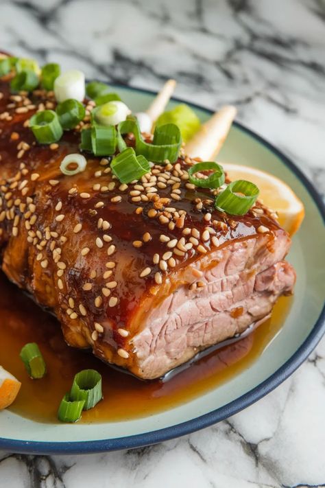 A photo of a  Asian-Inspired New Year's Pork Tenderloin a New Years Pork Tenderloin Recipes Asian Pork Loin, Easy Savory Recipes, Sheet Pan Pork Tenderloin, Asian Pork Tenderloin, Sheet Pan Pork, Asian Pork, New Years Dinner, Tenderloin Recipes, Pork Tenderloin Recipes