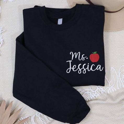 Amazon.com: Personalized Teacher sweatshirt, Embroidered Teacher Name Crewneck Sweatshirt, new teacher Gift for teacher, teacher appreciation gifts : Handmade Products New Teacher Gift, New Teacher Gifts, Teacher Clothes, Teacher Sweatshirt, New Teacher, Teacher Teacher, Teacher Name, Teacher Outfits, Gift For Teacher