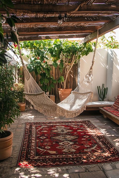 Bohemian patio. Macramé hanging chair under white canopy with layered red kilim rugs.

The calm and creative universe of bohemian decor meets the outdoors in these 67 mind-blowing patio designs, where colorful Moroccan tile floors take center stage. Versatile, energetic, and vibrantly captivating - these tiles aren't just flooring; they are conversation starters paving the path to your cozy outdoor oasis.

Read more: https://tastyinteriors.com/generated-post-67-bohemian-patio-oasis-designs-colorful-moroccan-tile-floors/ Moroccan Outdoor Patio, Moroccan Terrace, Moroccan Patio, Moroccan Tile Floor, Moroccan Courtyard, Moroccan Outdoor, Patio Oasis, Photography Studio Decor, Bohemian Patio