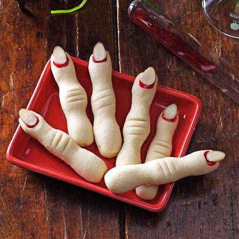 Frightening Fingers Recipe -These cookies have become somewhat famous at the school our children attend. One year, I made more than 150 of these "fingers" for their classroom Halloween parties.—Natalie Hyde, Cambridge, Ontario Halloween Fingerfood, Witch Finger Cookies, Finger Cookies, Classroom Halloween Party, Witches Fingers, Halloween Appetizers, Halloween Baking, Halloween Cookies, Halloween Recipes