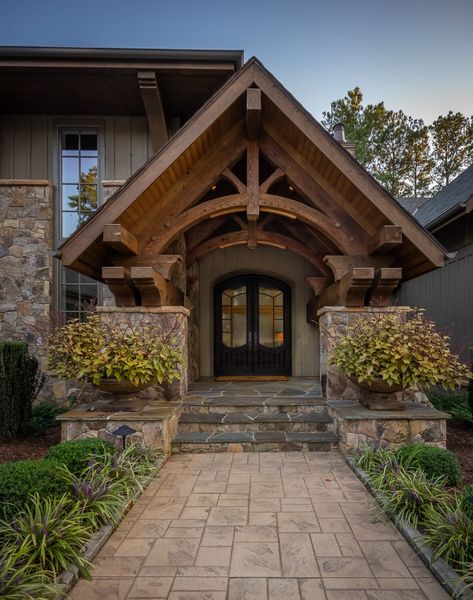 Timber Frame Entryway | Timber Frame Entryway Designs Timber Trusses, Timber Frame Porch, Rustic Craftsman, Craftsman Style Homes, Rustic Home Design, Timber Frame Homes, House With Porch, Front Entrance, Exterior Stone