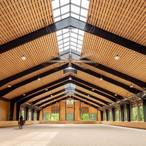 Blackburn Architects on Instagram: “Let’s look at some of our indoor arenas. Do you prefer the sharp, clear contrast of black or the subtle, cool palette of white?…” Wellness Facility, Luxury Horse Stables, Luxury Horse Barns, Dream Barn Stables, Luxury Horse, Equestrian Stables, Cool Palette, Horse Arena, Dream Stables