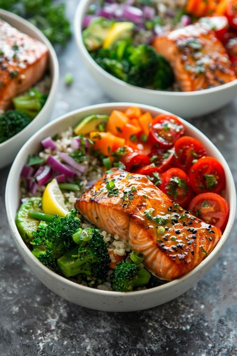 Looking for a quick and nutritious meal idea? Try making salmon bowls! These salmon bowl recipes are not only healthy but also easy to prepare, perfect for busy days. Whether you're into meal prepping or want a delicious lunch option, these salmon bowls have got you covered. Packed with protein, omega-3 fatty acids, and colorful veggies, these bowls will keep you satisfied and energized throughout the day. Colorful Meal Prep, Healthy Colorful Dinner Recipes, Easy Dinner Recipe Healthy, Grilled Salmon Poke Bowl, Healthy Eating Salmon, Salmon Food Prep, Healthy Fish Lunch Ideas, Smoked Salmon Bowl Recipes, Healthy Colorful Meals