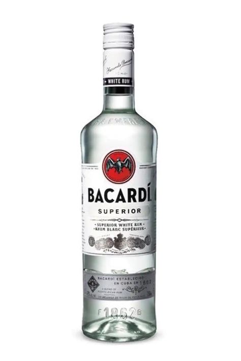 With its unique balance and light taste, Bacardi Superior pairs beautifully with mint and lime without being overly dominant in the cocktail. This means that it's perfect for a mojito or a Cuba Libre, but without the overwhelming taste of alcohol. The reason for this wonderful marriage lies in the undertones of the rum, which imparts flavors such as citrus, coriander and ginger. Each batch of Bacardi White Rum gets these flavors thanks to the highest-quality ingredients, including sugar cane and Strawberry Mojito Pitcher, Best Rum For Mojitos, Mojito Pitcher, Good Rum, Strawberry Mojito, Bacardi Rum, Aged Rum, Tipsy Bartender, Jungle Juice