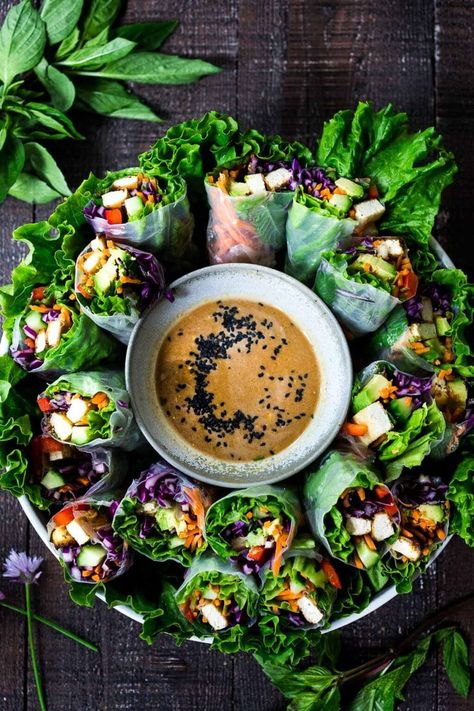 How to make fresh Spring Rolls with BEST EVER Peanut Sauce! These VEGAN spring rolls can made ahead and stored for healthy lunches or potlucks and gatherings. #springrolls #veganspringrolls #freshspringrolls #howtostorespringrolls #howtomakespringrolls Fresh Spring Rolls Recipe, Spring Rolls With Peanut Sauce, Vegan Spring Rolls, Homemade Peanut Sauce, Ashanti People, Peanut Sauce Recipe, Spring Roll Wrappers, Fresh Spring Rolls, Spring Roll Recipe