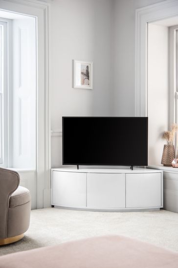 White Mode Curved Corner TV Stand Tv In Corner Of Bedroom, Tv Corner Wall Ideas, Tv Corner Ideas, Tv In Corner Of Living Room, Small Corner Tv Unit, Corner Tv Ideas, Corner Tv Units, Modern Corner Tv Stand, Tv Unit With Storage