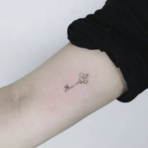 Tiny single needle key tattoo on the right inner arm. Secret Garden Key Tattoo, Key Tattoo With Flowers, Key Tattoos For Women, Tattoos For Women Forearm, Vintage Key Tattoos, Small Key Tattoos, Tattoo Key, 2006 Tattoo, Heart Key Tattoo