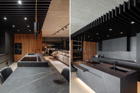 A Matte Black Kitchen Makes A Strong Statement Inside This Home Black Wood Ceiling, Minimalist Cabinets, Modern Concrete House, Small Sitting Areas, Countertop Choices, Light Wood Kitchens, Diy Screen Door, Minimalist Cabinet, Matte Black Kitchen