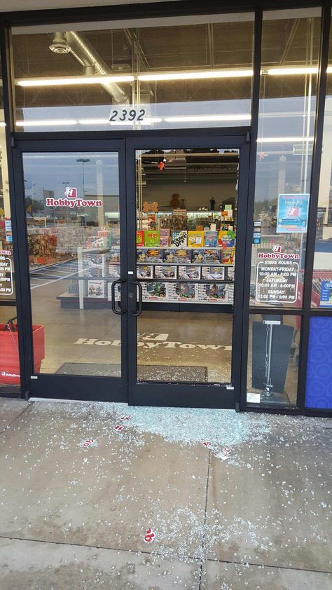 Broken Storefront Door Glass Storefront Doors, Shoe Store Design, Broken Glass, Store Front, Shoe Store, Store Fronts, Glass Mirror, Store Design, Glass Door