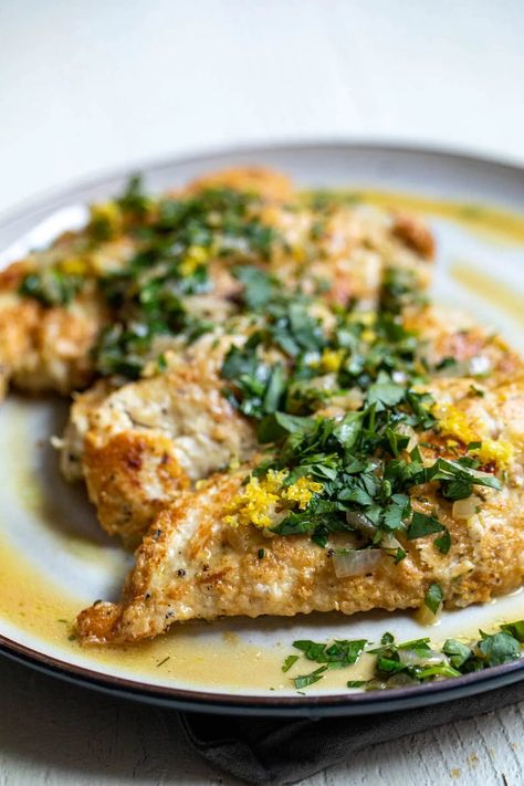 Whether you serve it on pasta or rice, these lemon chicken cutlets are fast to make and so flavorful. I prefer to serve them with a quick buttery pan sauce! crunchtimekitchen.com #chicken #cutlets #quick Lemon Chicken Cutlets, Easy Lemon Chicken, Chicken Cutlet Recipes, Chicken Cutlet, Pork Schnitzel, Cutlets Recipes, Pan Sauce, Crispy Cheese, Cheese Crust