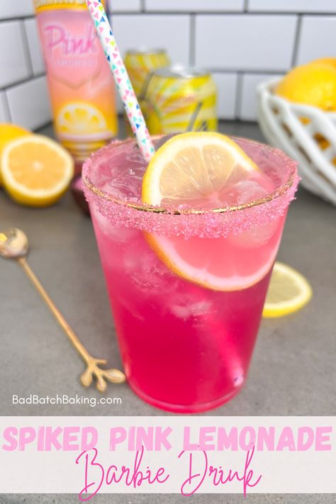 Spiked Pink Lemonade Barbie Drink - Bad Batch Baking - Restaurant Copycat Recipes & Family Favorites Pink Lemonade Shots, Barbie Pink Lemonade, Pink Colored Drinks, Smirnoff Pink Lemonade Recipes, Y2k Party Drinks, Barbie Party Drinks, Pink Batch Cocktail, Barbie Themed Drinks, Barbie Drinks Alcohol