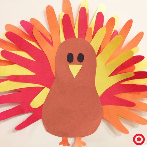 I remember making one of these when I was a kid! Have a stack of construction paper, scissors, pencils and glue, ready for the kids to trace their hands to make their own turkeys on Thanksgiving! Target Crafts, Hand Turkey Craft, Thanksgiving Arts And Crafts, Turkey Crafts Kids, Hand Turkey, Paper Turkey, Crafts Thanksgiving, Thanksgiving Crafts For Toddlers, Turkey Handprint