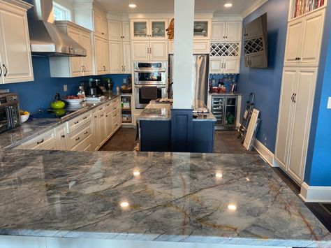 Does anyone have Ijen Blue Quartzite in their home? Blue Marine Quartzite, Blue Lava Quartzite Countertops, Deep Blue Quartzite, Ijen Blue Quartzite Kitchen, Ijen Blue Quartzite, Quartzite Bathroom, Blue Kitchen Countertops, Quartzite Kitchen Island, Blue Countertops