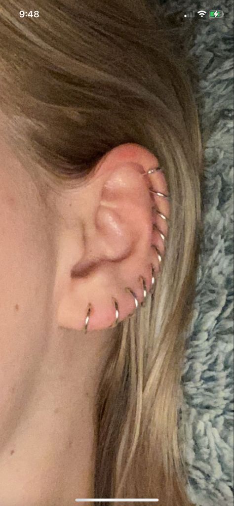 lobe piercings all the way up the ear in hoops Dnd Halfling, Lobe Piercings, Ear Party, Lobe Piercing, The Ear, All The Way Up, All The Way, Piercings, The Way