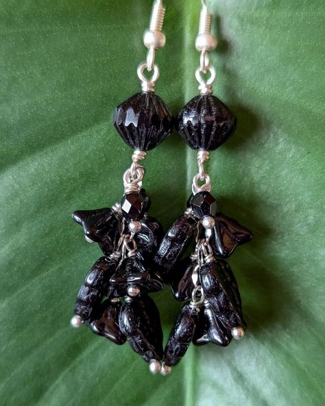 The Witch's Garden earrings, all in black and silver. I dream of one day having a black garden – all black, dark red, and dark purple plants. I want to be the witch who lives in the woods nearby that everyone avoids. ☺️🩵 Mwuahahah Dark Purple Plants, Witch's Garden, Garden Earrings, Witch Garden, Purple Plants, Black Garden, The Witch, I Want To Be, Black And Silver