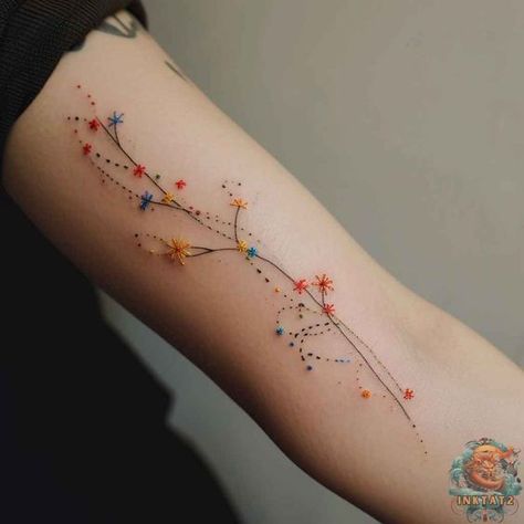 A constellation of colorful stars connected by delicate dotted lines makes for a whimsical, airy tattoo design. Perfect for anyone seeking playful yet elegant tattoo ideas, female art lovers can find more at inktat2.com. Stitches Tattoo, Elegant Tattoo Ideas, Whimsical Tattoos, Stitch Tattoo, Dot Tattoos, Constellation Tattoo, Tattoos For Women Flowers, Tattoo Photography, Floral Tattoo Sleeve