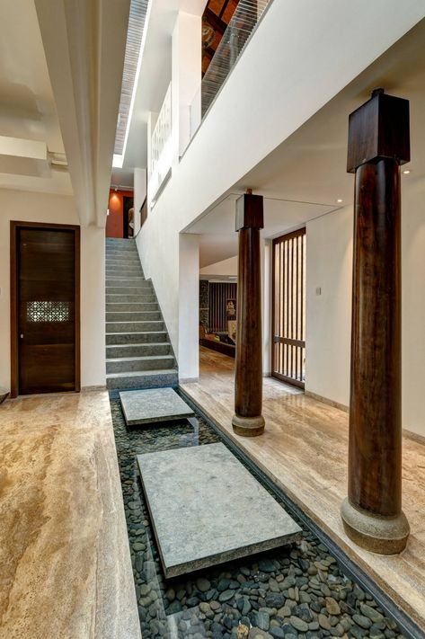 The Courtyard House - Corridor - Pune - by VDGA Indoor Pond Living Rooms, Interior Design India, Indoor Pond, Indoor Courtyard, Terrace Garden Design, Water Body, Open Staircase, Concrete Stairs, Pooja Room Design