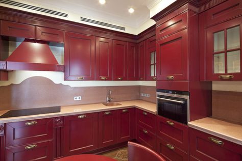 Here's an example of red wood kitchen cabinets in a kitchen. Red Kitchen Cabinets, Red Interior Design, Kitchen Cabinets Pictures, Red Cabinets, Bold Kitchen, Wood Kitchen Cabinets, Kitchen Cabinet Doors, Kitchen Cabinet Colors, Red Kitchen