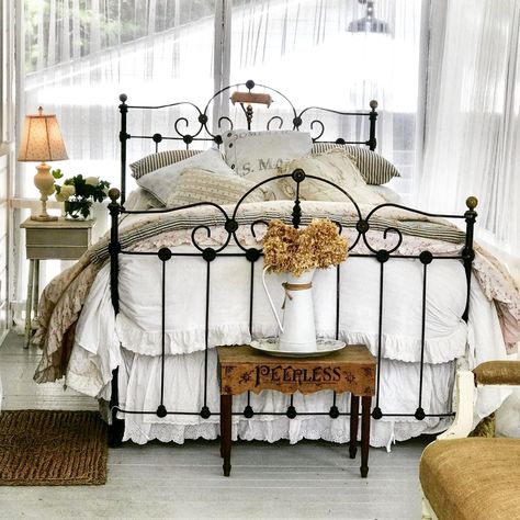 This beautifully designed setting was enhanced with the use of an antique iron "bowed footboard" bed frame from the mid 1800's. Cleaned and left in its original painted "finish".....the contrast of the black paint and the lighter earth tone surroundings help us to appreciate both surroundings and the bed frame. Vintage Bed Frames, Footboard Bed, Antique Iron Beds, Vintage Bed Frame, Iron Beds, Victorian Vintage, Iron Bed, Antique Iron, Vintage Bed