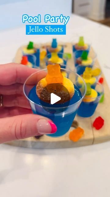 Jessica Neff | Holiday Recipes | Cocktail Recipes on Instagram: "Pool Party Jello Shots ☀️💦🏖
☀️Spring Break Fun ☀️

Ingredients:
* 3 ounces blue raspberry flavored gelatin mix @sonicdrivein 
* 1 cup boiling water
* 1 cup vodka @titosvodka 
* Peach ring gummi candy
* Gummi bears @heb 
* 1 ounce disposable cups

#jello #jelloshots #poolparty #poolpartydecor #jelloshot #pooltime #summervibes #drinkrecipes #cocktail #cocktailrecipes #beachdrinks #candy #gummibears #peach #sonic #heb #oceanwater #springbreak #springbreakers #summervibes #summerrecipe" Pool Party Jello Shots With Gummy Bears, Pool Party Jello Shots, Party Jello Shots, Infused Sweets, Peach Ring, Gummi Candy, Gummi Bears, Jello Shot Recipes, Dinner Party Decorations