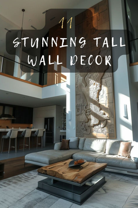 Looking for tall wall decor inspiration? Discover 11 must-have ideas that can bring style and sophistication to your high-ceilinged space. Click to find out which designs could be perfect for you. 🖼️🛋️ #TallWallDecor #HighCeilings #HomeStyling #InteriorDesign #DecorInspo Double Height Room Design, How To Decorate Tall Walls High Ceilings Kitchen, Tall Wall Gallery Ideas, Double Height Room, 2 Story Foyer Artwork, High Wall Decorating Ideas Living Rooms, High Ceiling Wall Ideas, Double Height Wall Decor, Tall Living Room Wall Decor Ideas