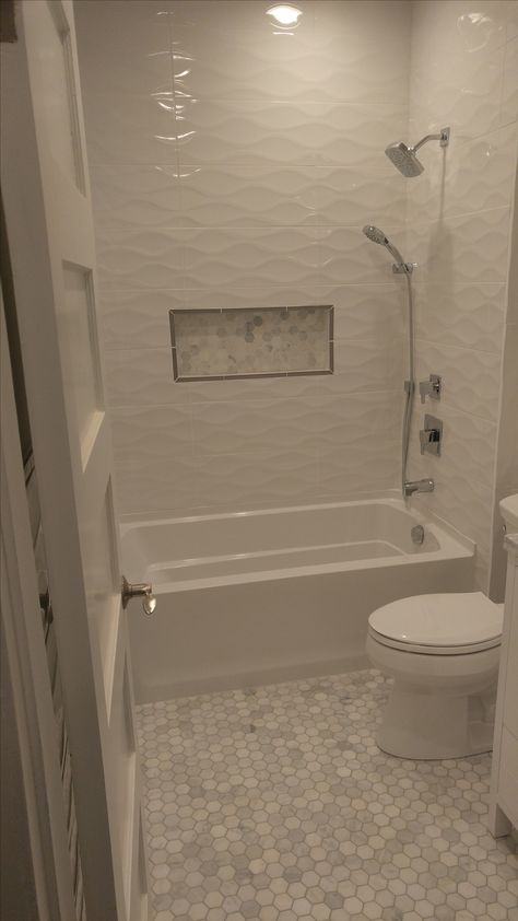 Tile Wall Shower Tub, Two Wall Shower Ideas, Tile Front Of Bathtub, Bathtub Tiling Ideas, Hallway Bathroom Remodel With Tub, Guest Bathroom Ideas Hexagon Tile, Bathroom Floor And Tub Tile Ideas, Bathroom Tile Above Tub, Alcove Tub Shower Tile Ideas