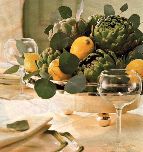 Rustic Italian Table Setting, Floral Arrangement With Fruit, Lemon Table Centerpieces, Artichoke Centerpiece, Artichoke Decor, Fruit Decor, Rustic Italian, Italian Table, Counter Decor