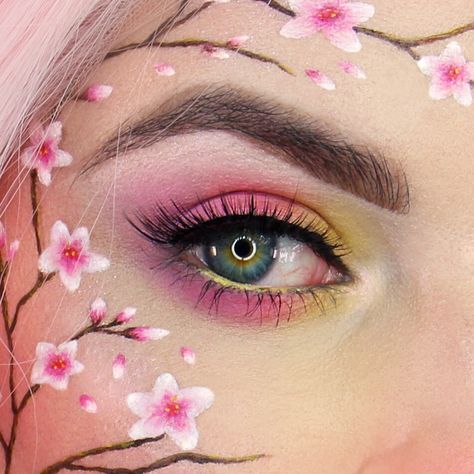 Cherry Blossom Makeup 🌸💕 | IG: @georgiarosex Halloween Flower Makeup, Sakura Flower Makeup, Spring Theme Makeup, Pink Flower Eye Makeup, Spring Themed Makeup, Cherry Blossom Eye Makeup, Cherry Blossom Face Paint, Cherry Blossom Makeup Look, Face Art Makeup Flowers