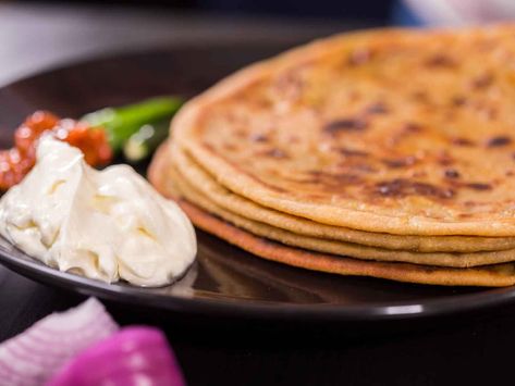 Alu Paratha, Spiced Potatoes, Season Cast Iron Skillet, Aloo Paratha, Tiffin Box, Seasoning Cast Iron, Chaat Masala, Coriander Leaves, Curry Leaves