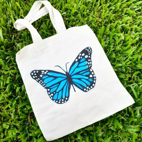 Totebag handmade Butterfly painting 🦋 Ig: @ansiedark.store Handmade Butterfly, Butterfly Painting, Blue Butterfly, Toad, Tote Bag, Blue, Quick Saves, Tela