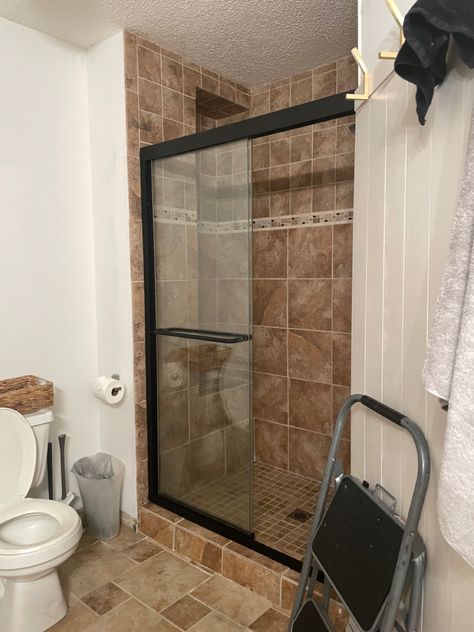 Door To Backyard From Bedroom, Tile Shower Remodel Diy, Can You Paint Shower Tile Walls, Brown Tile Bathroom Makeover, Bathroom Remodel With Brown Tile, Painting Bathroom Floor Tiles Diy, Paint Tile Shower Wall, How To Paint Shower Tiles In Bathroom, Painting Tile Shower Wall Before And After