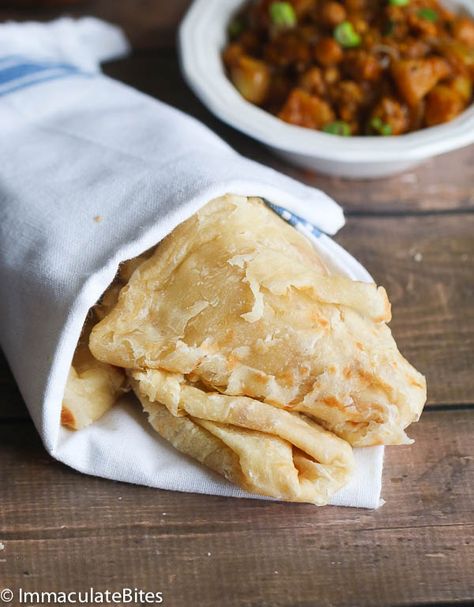 Buss up shut paratha roti- A Trinidad version - Super Soft, Messy and Tasty . Easy with step- by- step pictorial Paratha Roti Recipe, Roti Recipe Guyanese, Paratha Roti, Chicken Roti, Caribbean Dishes, Trinidadian Recipes, Guyanese Recipes, Trinidad Recipes, Carribean Food