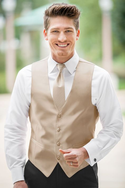 As handsome as can be! Happy and anticipating groom wearing a champagne vest and tie. Ready for action! Groomsman Attire, Groomsmen Vest, Wedding Vest, Grey Prom Dress, Tuxedo Vest, Wedding Dress Champagne, White Tuxedo, Black Tux, Vest And Tie