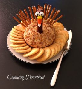 Thanksgiving Turkey Cheeseball, Turkey Cheeseball With Pretzels, Cheese Ball Turkey Shape, Turkey Cream Cheese Ball, Turkey Hors D’oeuvres, Thanksgiving Cheeseball Turkey, Turkey Dessert Board, Turkey Tail Cheese Board, Cute Thanksgiving Decor