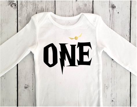 1st birthday boy the chosen one Harry Potter themed onesie.  Long or short sleeves. First Birthday Shirt, Golden Snitch, Chosen One, First Birthday Shirts, Baby Boy 1st Birthday, 1st Birthdays, Boy First Birthday, The Chosen, 1st Boy Birthday