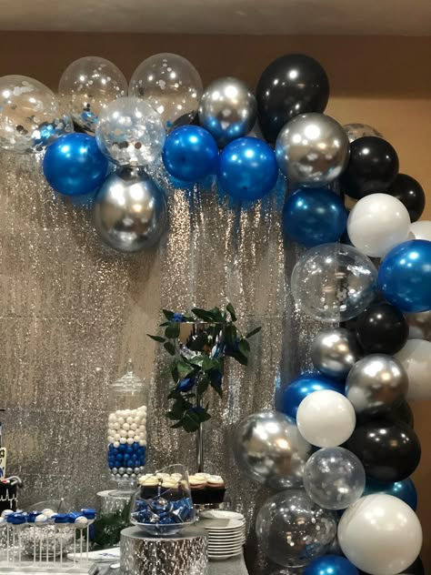 Graduation balloon garland. Dessert table royal blue, silver, and black. Graduation Balloon Garland, Blue Graduation Party, Black Party Decorations, Silver Party Decorations, Graduation Photo Booth, Blue Party Decorations, Deco Ballon, Blue Birthday Parties, Blue Graduation