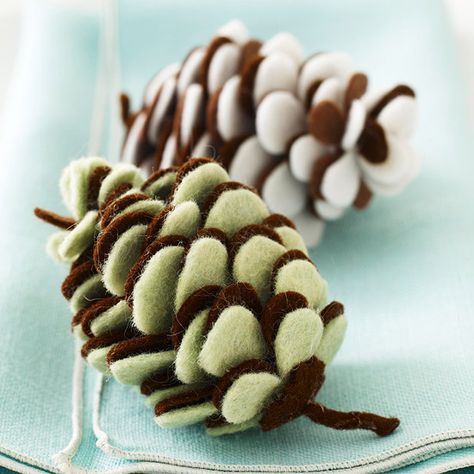 These felt pinecone ornaments are an inexpensive project that can be used for years. Find out how to make them: http://www.bhg.com/christmas/crafts/make-christmas-ornaments-with-felt/?socsrc=bhgpin093012feltpinecones#page=12 Felt Ornaments Diy, Diy Felt Christmas Tree, Pine Cone Christmas Tree, Ornaments Tree, Pinecone Ornaments, Pine Cone Crafts, Felt Christmas Tree, Navidad Diy, Tree Pattern